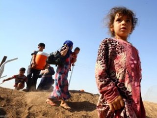 Francoska delegacija z nadškofom obiskala Irak